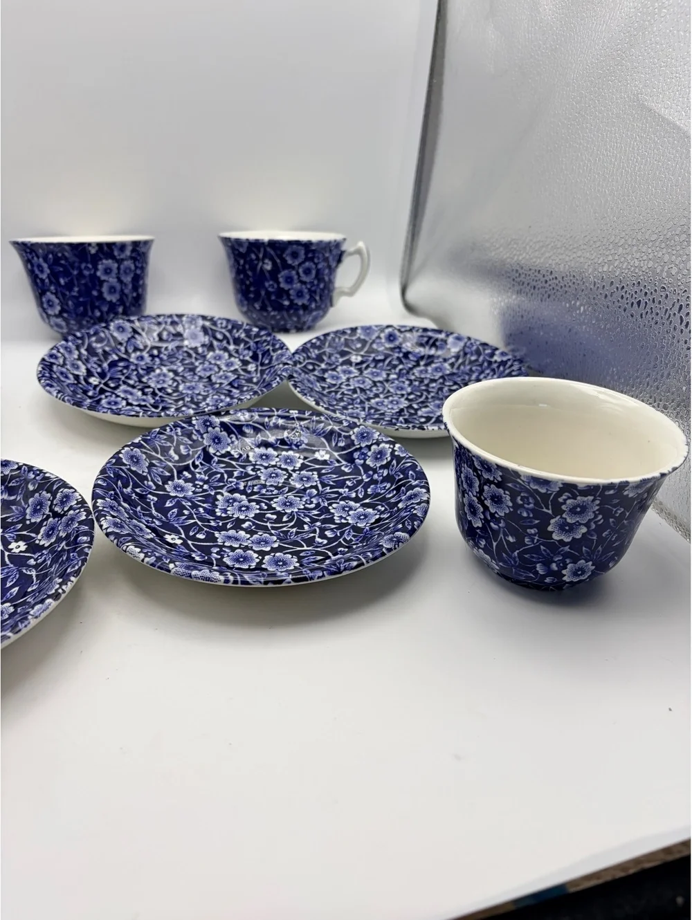 5 vintage sets of cups and saucers. Blue on white 1968 England.